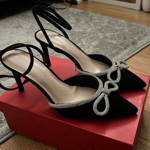 Black suede crystal bow heels